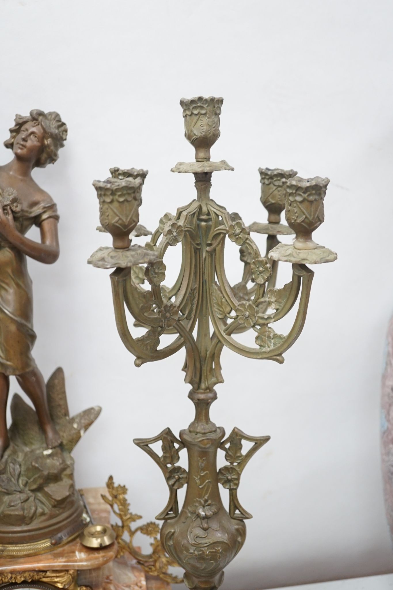 A French onyx and spelter figural clock garniture 66cm